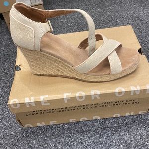Brand new TOMS strapped wedge metallic Suede